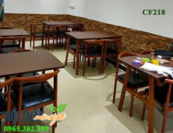 Bàn ghế Bull với tông màu nâu óc chó với nệm da đen lịch sự, sang trọng