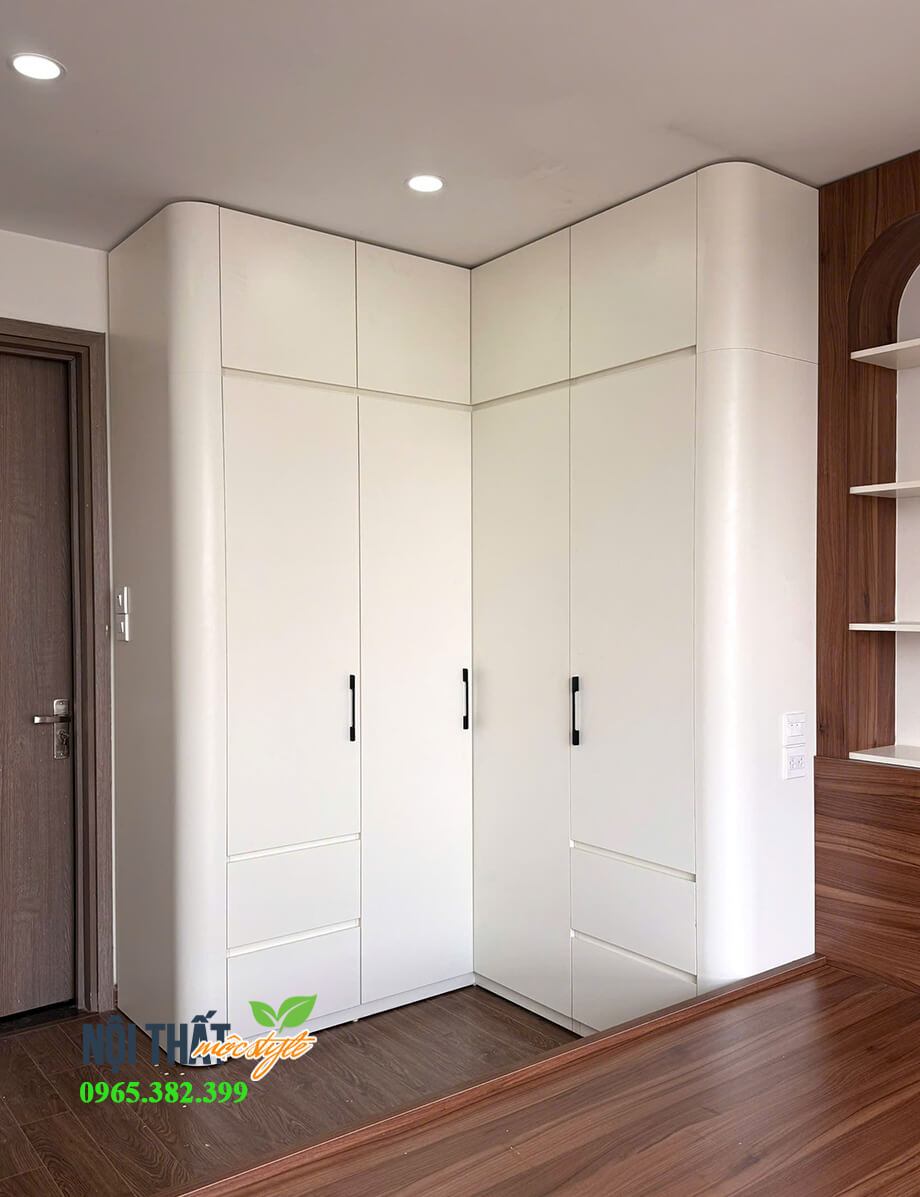 Tủ quần áo chữ L bo cong 2 đầu gam màu trắng kem tinh tế Tủ quần áo chữ L bo cong 2 đầu gam màu trắng kem tinh tế